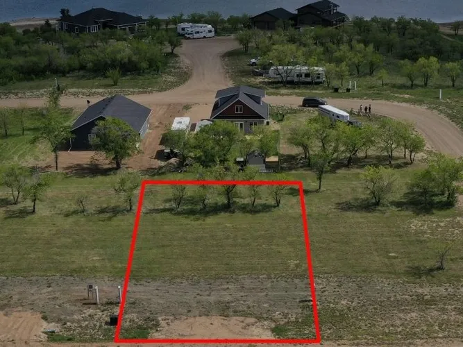 Aerial view of Lot 16, Block 2 at Sandy Shores Resort & Marina with the lot boundary outlined in red