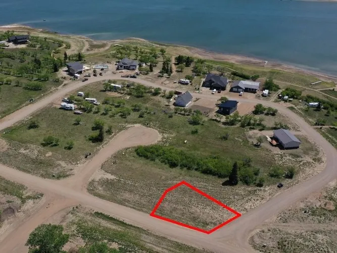 Aerial view of Lot 16, Block 4 at Sandy Shores Resort & Marina with the lot boundary outlined in red