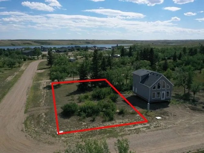 Aerial view of Lot 1, Block 7 at Sandy Shores Resort & Marina with the lot boundary outlined in red
